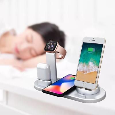 China Smart Watch 4 in 1 Multifunctional Wireless Charger Station for Mobile Phone Charging Station for Smart Watch USB Fast Charger for sale