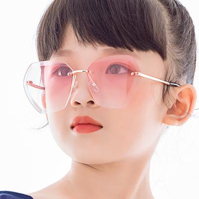 China Fashion Sunglasses Wholesale Irregular Rimless Pink Sunglasses Children's Sunglasses Fashion Kids Shades Children's Gift for sale