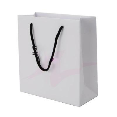 China Recyclable Wholesale Custom Paper Bag With Your Own Logo for sale