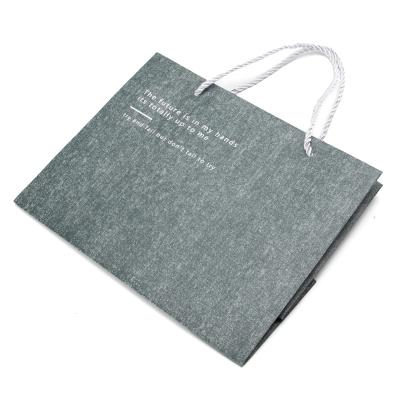 China Recyclable Packaging Custom Logo Gift Shopping Kraft Paper Bag For Jewelry for sale