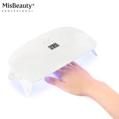 China hot-selling 24W Lamp Portable Wireless Intelligent Led Mini UV Gel Manicure Machine Rechargeable Mini Cordless Polish Dryer For Nail Art SN246 for sale