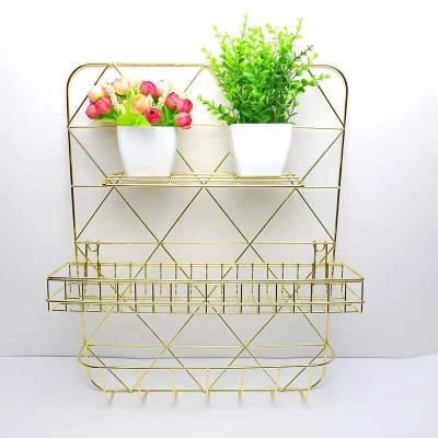 China Creative Luxury Custom Rack Shelf Storage Rack Ornament Display Wire Morden Iron Wall Mesh Photo Hanging Ornaments for sale