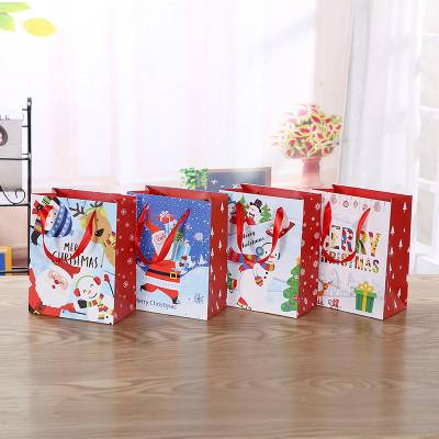 China China Factory Product Recyclable Christmas Popular Pattern Paper Bag With Ribbon Handle for sale