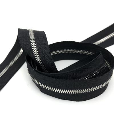 China Durable Polished Bright Silver Metal Zipper Teeth Can Be Customized Zipper Length for sale