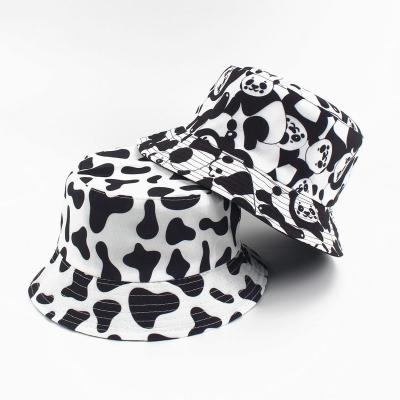 China Parasol Customized Printing Reversible Logo Milk Cow Pattern Woman Bucket Hat Hat for sale