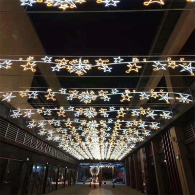 China Large Outdoor Handmade LED Christmas Pattern Through Street Lights For Commercial City Christmas Decoration for sale