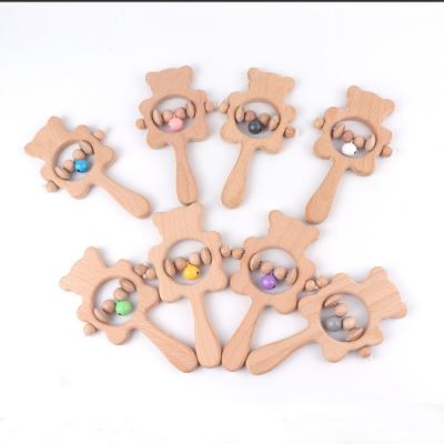 China Musical Toys Beech Molar Bear Jingles Wooden Crafts Ornaments Decorative Toys Hand Teether Wooden Ring Teethers for sale