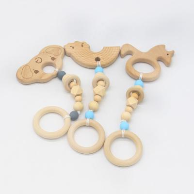 China Musical most popular pacifier clip baby clip rabbit pacifier chain rabbit wooden clip wooden pacifier chain wholesale wooden pacifier for sale