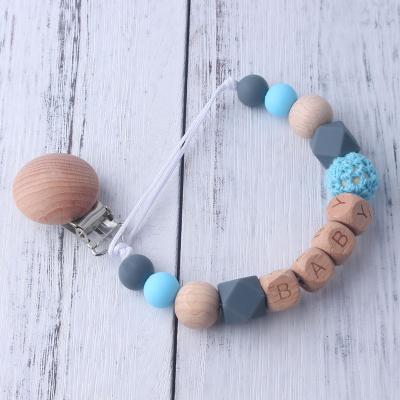 China 6-12 Months Baby Silicone Letter Wooden Silicone Teething Chain Mute Eco-Friendly Teething Safe Teether Cuts Bracket Silicone Wood Paci for sale