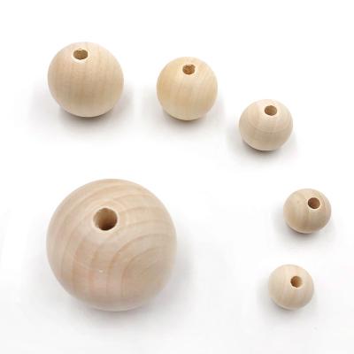 China Factory Direct Small Round Wooden Beads Diy Wooden Beads 4-50mm Lotus Round Flower Wholesale Solid for sale