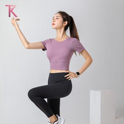 China Yoga Suit Breathable Popular Seamless Sports Shirts Crop Top Gaiters Gym Clothes Fitness Tracksuit Workout Set for sale