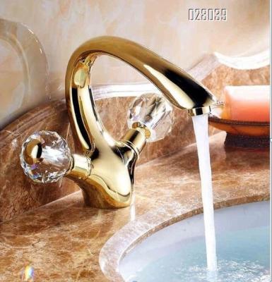 China Gold Zirconium Faucet Metered Crystal Bathroom Basin Faucet Modern Double Handle Faucet for sale