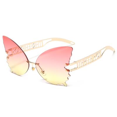 China New Women's Large Butterfly Personality Letter Cavity Rimless Eyeglasses Women's Sunglasses Women's Sunglasses Women for sale