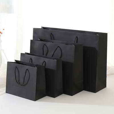 China Handmade horizontal paper bag clothing store handbag gift bag advertising printing high-end logo card shopping black paper bag for sale