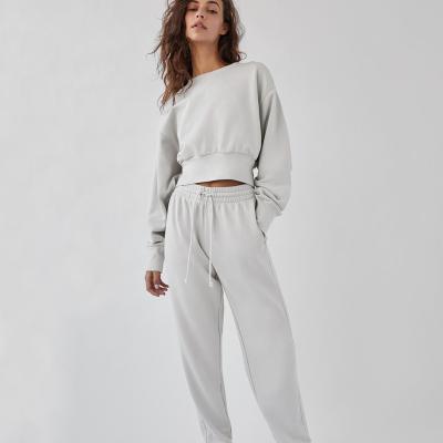 China Anti-wrinkle women's sports long pants 100% cotton pants and casual pants sweatshirt women stacked pants for sale