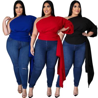 China Breathable plus size solid color shoulder puff sleeve oblique asymmetrical full size 2021 fashionable casual for sale