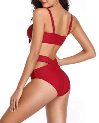 China 2021 Hot Selling Hollow Solid Color Viable Low Cut Irregular Women Bandage Shoulder Navel Swimwear for sale