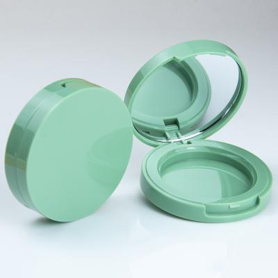 China Recyclable Custom Empty Compact Powder Container Round Mirror Green Compact Powder Case Face Powder Packaging for sale