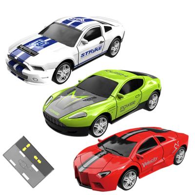 China 2.4g Mini RC Hobby SINOVAN RC Model Car 1:64 RC Car With Parking Lights Single Mini Car Toy Spare Part for sale