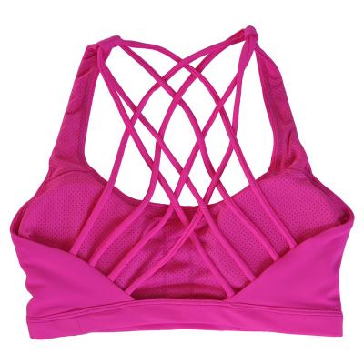 China Newest Stylish Seamless Women's Sports Strappy Bra Antibacterial Padded Sexy Crop Top Yoga Bra for sale