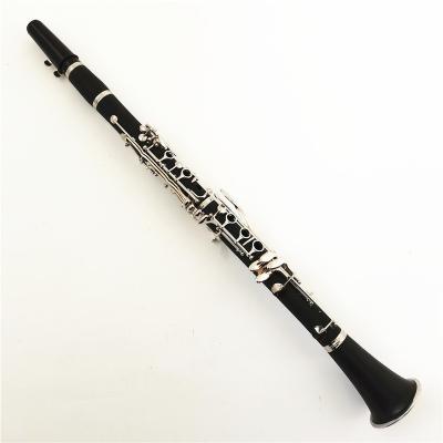 China Professional small wooden clarinet bored dimension hard rubber material bb clarinet for sale