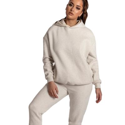 China Hot Selling Women's Breathable Casual Sports Sweatsuit Solid Color Hooded Loose Tracksuit Set for sale