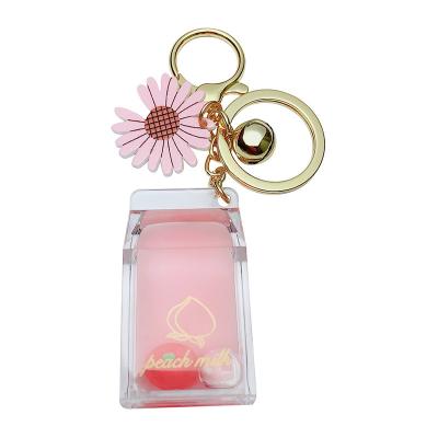 China Daisy Keychain Acrylic Bottle Doll Cartoon Decoration Gift Small Student Korean Bag Ornament Fruit Floating Keychains for sale