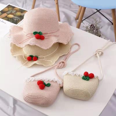 China Girls Hot Sale Striped Logo Fedora Raffia Straw Hat Cherry Flower Decoration Kids Baby for sale