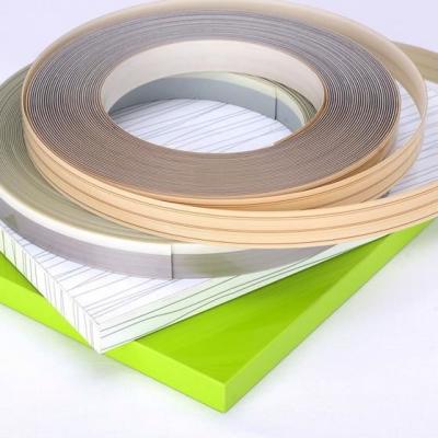 China Eco - Friendly Vinyl T Molding Plastic Table Edge Trim Dark PVC Edging for sale