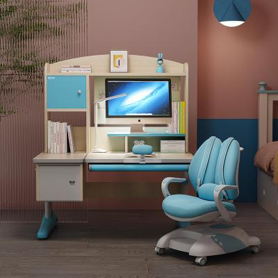 China Eco-Friendly Height Adjustable Tables Kids Study Desk Ergonomic Desk With Book Shelves Kids Furniture Kids Growable Desk for sale