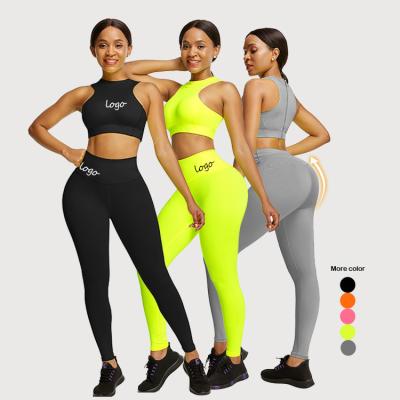 China Breathable Logo Sportswear Elasticity Back Sexy Custom Made Sport Tops Zipper Back Women Workout Clothing Two Piece Set Gym for sale