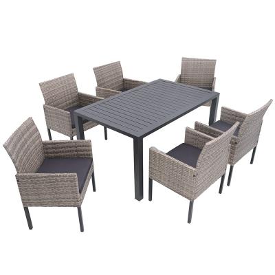 China Includes 6pcs Padded Chairs and 1 Hot-selling 6 Seats 2019 Aluminum Table PE Rattan Patio Furniture Set with Cushion for Outdoor Leisure for sale