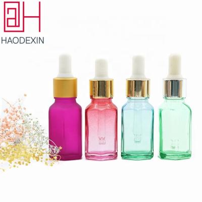 China HAODEXIN 15ml cosmetic essential oil hexagon gradient colored dropper glass bottles wholesale portable essential oil bottle with glass dropper for sale