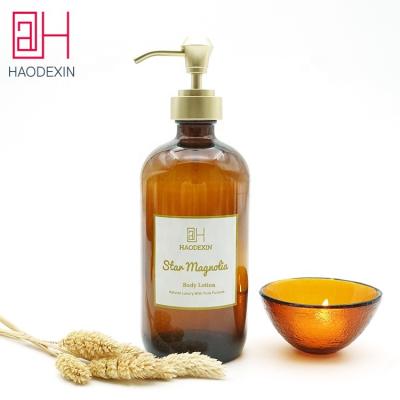 China HAODEXIN 500ml Personal Care Shampoo Refillable Bottle Glass With Gold 16oz Pump Boston Amber Round Glass Bottles Pharmaceutical Glass Bottle for sale