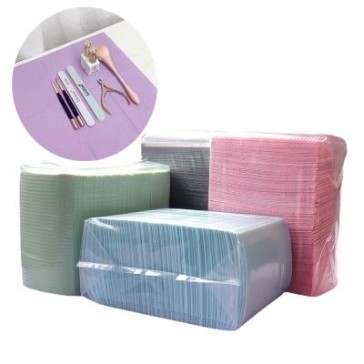 China Wholesale 125PCS/Pack Nail Art Lint Free Table Mats Disposable Eco-Friendly Material Nail Mats Finger Waterproof Mat Disposable for sale