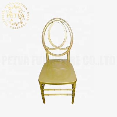 China Modern wholesale gold round back dining acrylic table and chair set for event used for sale