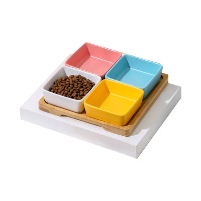 China Mini Ceramic Dish Sustainable Pet Dry And Wet Cat Food Bowl With Separation Cat And Dog Fruit Color Food Stand for sale