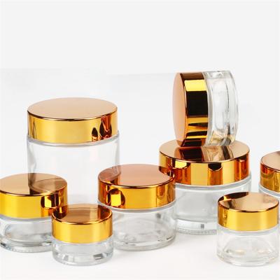 China Hot Sale 5ml 10ml 15ml 20ml 30ml 50ml 100ml Skin Care TOSUN Cream Empty Clear Glass Cosmetic Jar With Lid For Face Cream for sale