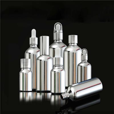 China TOSUN Personal Care 5ml 10ml 15ml 20ml 30ml 50ml 100ml Silver Empty Round Glass Bottles Essential Oil Dropper Bottle Packaging for sale