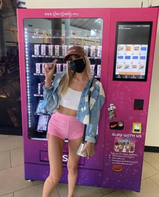 China Steel Custom Whips Cosmetic Pink Hair Beauty Vending Machine Mini Lashes Vending Machine Customized Wrap for sale