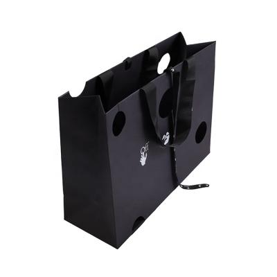 China Eco-friendly Luxury Black Custom Printed Gift Paper Bag Large Logo Jewelry Packaging Bag With Ribbon Handles for sale