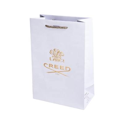 China Handmade Custom Paper Gift Bag Packaging Shopping Bags For Shoes And Apparel Packaging for sale