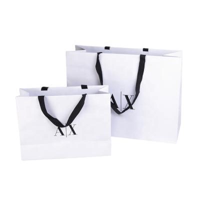 China Personalized Recyclable Offset Printing Luxury Paper Gift Bags With Shoulder Length Handle for sale