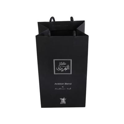 China Eco - Friendly Wholesale Custom Luxury Paper Goods Clothing Bags Black Shopping Gift Bags for sale