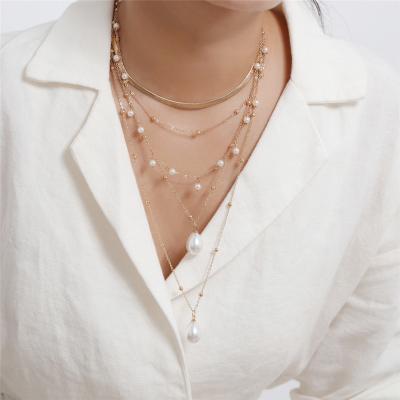 China FASHIONABLE Hot Sale Alloy Pearl Tassel Wedding Layer Gothic Pearl Necklace For Women for sale