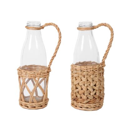 China New Viable Outer Woven Unbreakable Glassware Gold Water Cups And Tumbler Small Portable Glass Fruit Juice Cup With Wicker Cove for sale