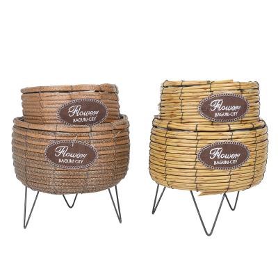 China Modern Plastic Rattan Flower Pot 2 Woven Basket Garden Pots Set For Storage With Metal Holder Round Shape for sale