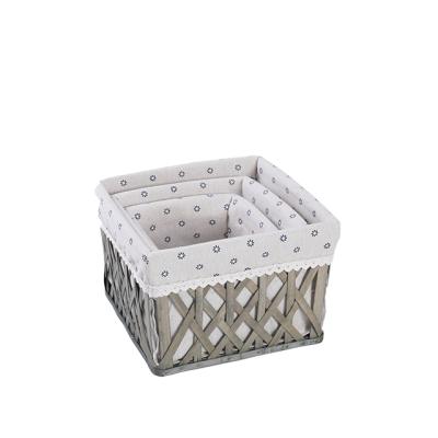 China Sustainable Household Hollow Wholesale Bamboo Basket for Storage Set with Polyester Bamboo and Gray Fabric Storage Basket for sale