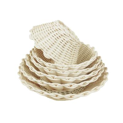 China New fashion grade breakfast rattan basket candy dried fruit basket snack food woven restaurant variety bread basket for sale