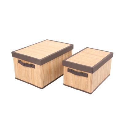 China Sustainable Fabric Basket Bamboo Storage Basket Set Of Two Straw Household Bamboo Handmade Bamboo With Lids With Natural Fabric Covering for sale